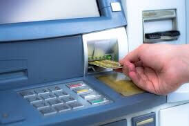 Man charged over fake ATM deposit