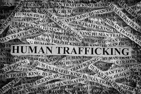 American arrested in human trafficking inquiry