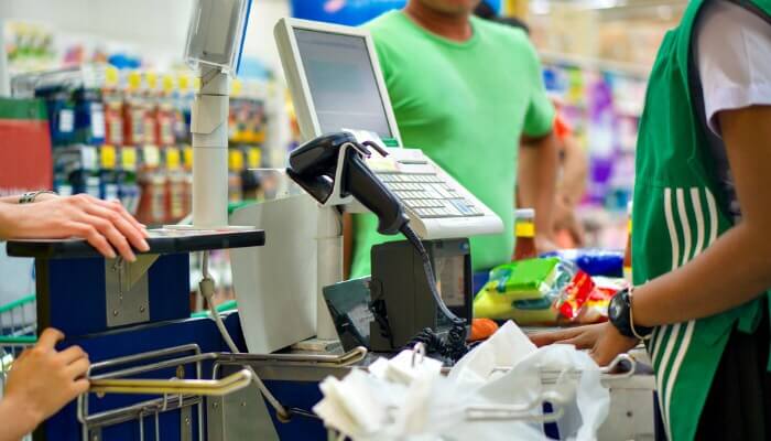 Cashier denies stealing grocery